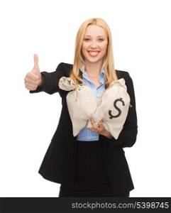 young businesswoman with money bags showing thumbs up