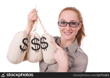 Young businesswoman with money sacks on white