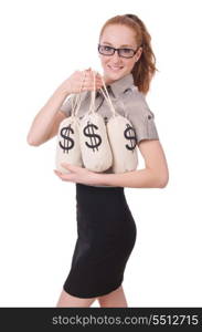 Young businesswoman with money sacks on white