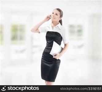 Young businesswoman with phone