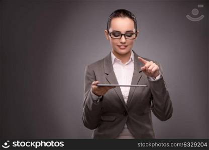 Young businesswoman working with tablet computer