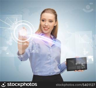 young businesswoman working with tablet pc and virtual screen