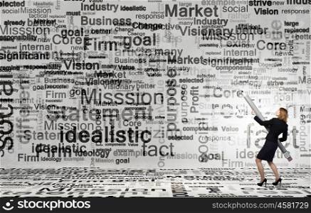 Young businesswoman writing marketing strategy concept with huge pencil. Business concepts