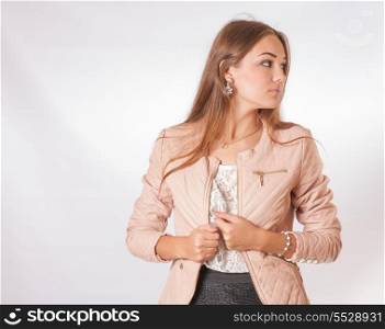 young businesswomen, blond haired female in skirt studio shot