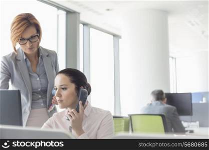 Young businesswomen working in office