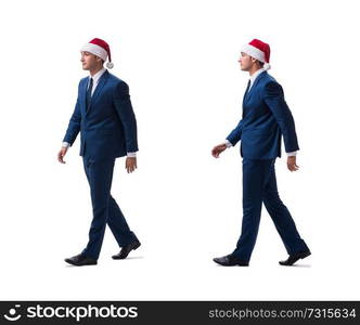 Young busnessman wearing santa hat in christmas concept on white