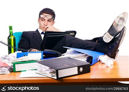 Young busy businessman at his desk