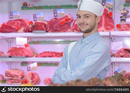 young butcher posing