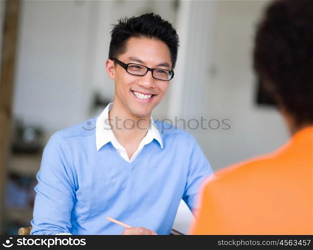 Young candidate having an interview with his employer. I am ready to answer your questions