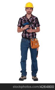 Young carpenter holding cordless drill