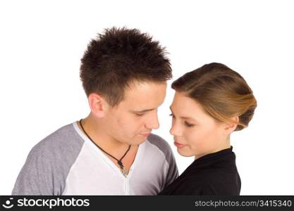Young casual attractive couple in romantic mood sharing a tender moment isolated on white background