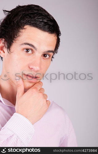 Young casual boy posing isolated