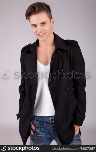 Young casual boy posing isolated