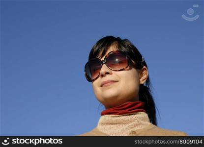 young casual girl portrait in the sun light