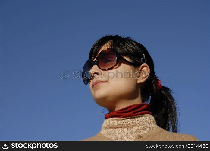 young casual girl portrait in the sun light