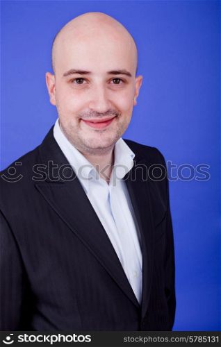 young casual happy man, on a blue background