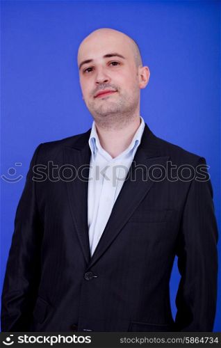 young casual happy man, on a blue background
