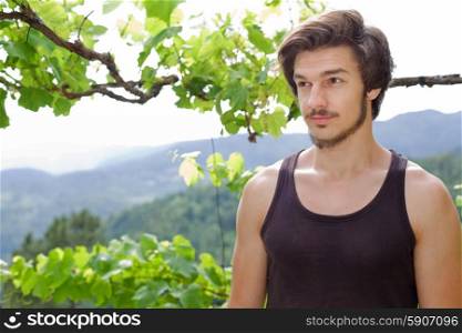 young casual happy man posing, outdoors