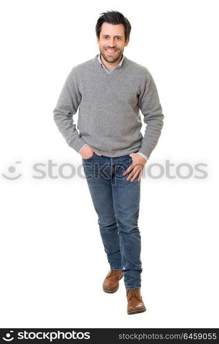 young casual man full body in a white background