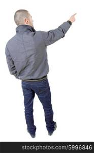 young casual man full body pointing, in a white background