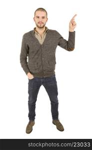 young casual man full body pointing, isolated on white