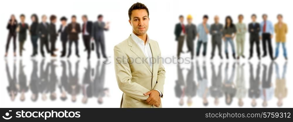 young casual man in front of a group of people