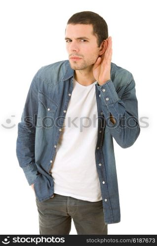 young casual man listening in white background
