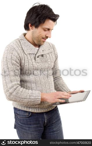 young casual man looking to his tablet pc, isolated