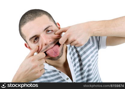 young casual man making silly face in a white background