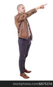 young casual man pointing, isolated on white. pointing