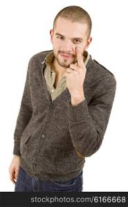 young casual man pointing to his eye, isolated on white