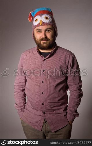 young casual man portrait in a dark background