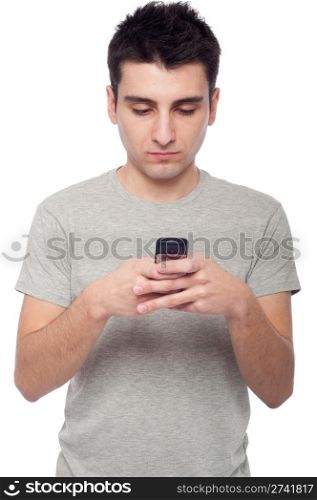 young casual man sending a text message isolated on white background