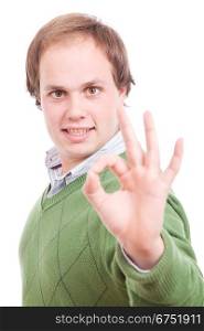 Young casual man signaling Ok - focus on eyes