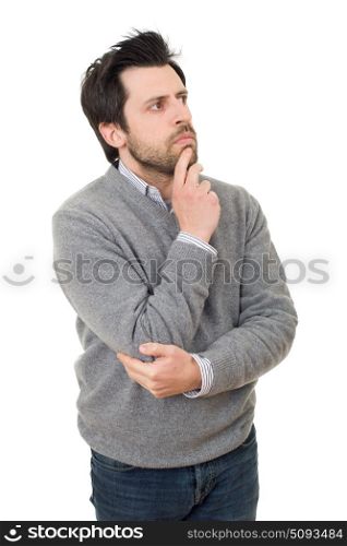 young casual man thinking, isolated on white background