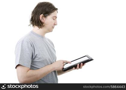 young casual man working with a tablet, isolated