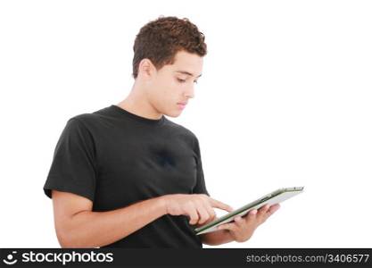 Young casual student working on a digital tablet. Isolated on a white background
