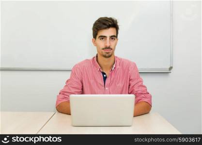 young casual teenager student in a classroom