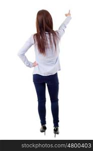 young casual woman full body, pointing, isolated on a white background