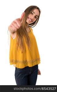 Young casual woman going thumbs up, isolated on white background. thumb up