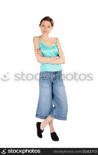 Young casual woman standing with arms crossed isolated over a white background