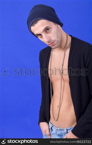 young casual young man on a blue background
