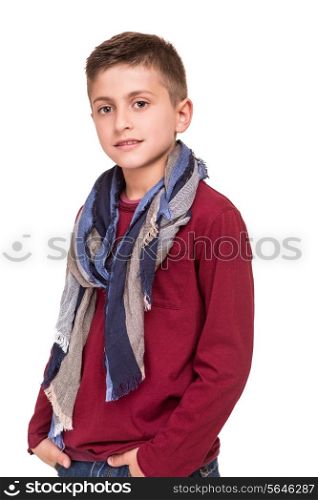 Young caucasian boy posing over white background