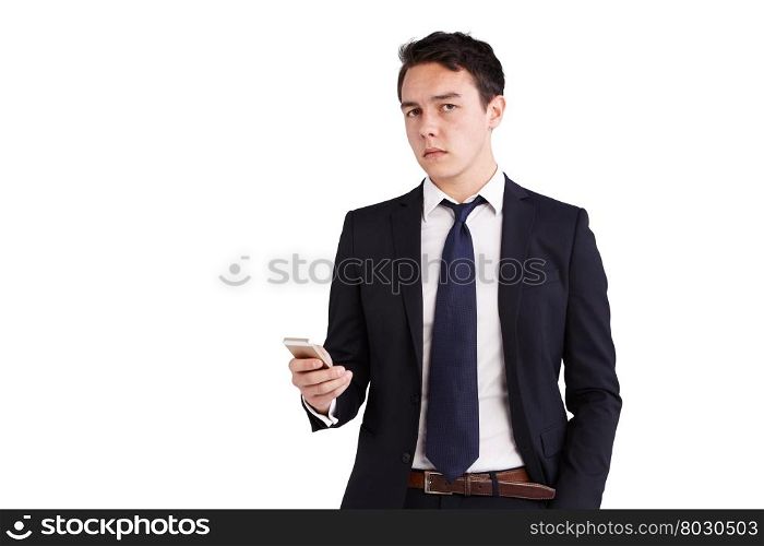 Young Caucasian business man holding a phone. A young Caucasian business man holding a phone looking at the camera.