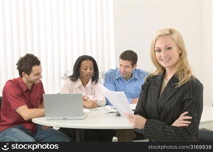 Young Caucasian Female Executive Leading A Business Meeting
