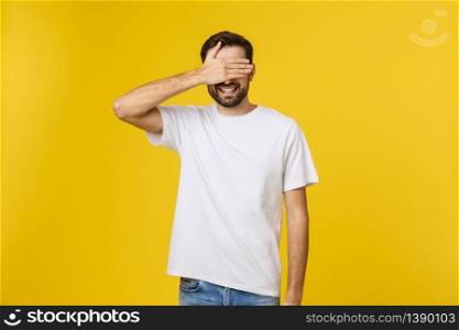 Young caucasian handsome man isolated on beige background covering eyes by hands. Do not want to see something. Young caucasian handsome man isolated on beige background covering eyes by hands. Do not want to see something.