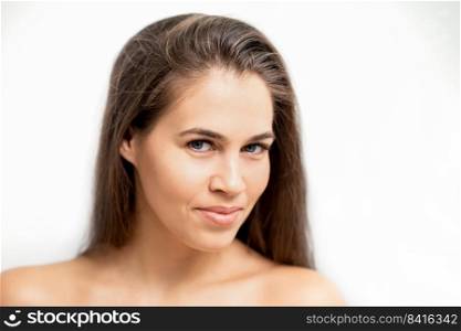Young caucasian woman beauty face portrait with healthy white skin isolated on white background. Young caucasian woman beauty face