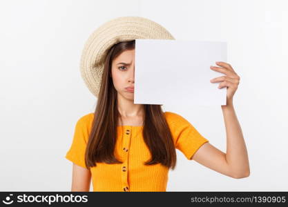 Young caucasian woman holding blank paper sheet over isolated background scared in shock with a surprise face, afraid and excited. Young caucasian woman holding blank paper sheet over isolated background scared in shock with a surprise face, afraid and excited.