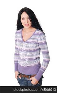 young charming brunette in a lilac sweater and jeans with a smile on her lips