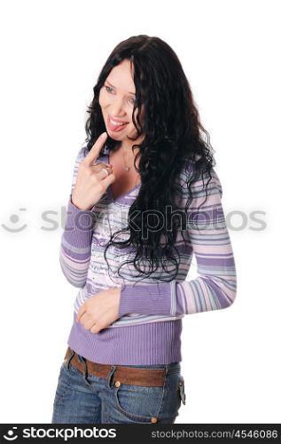 young charming brunette in a lilac sweater and jeans with a smile on her lips